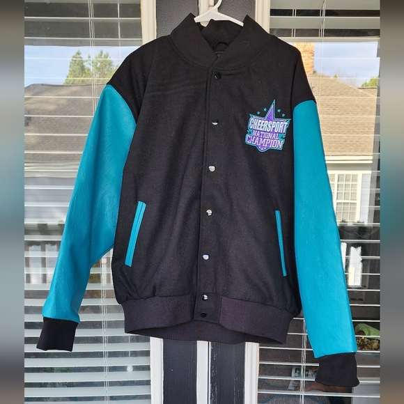 Varsity Other - Cheersport National Champion varsity jacket black body and turquoise sleeve XXXL